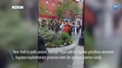 New York'ta Polis Aracını Göstericilerin Üzerine Sürdü