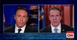 New York Valisi Andrew Cuomo (sağda) ve kardeşi CNN sunucusu Chris Cuomo (solda)